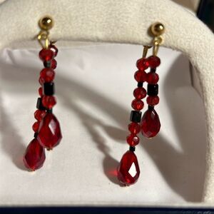 Avon colorful shower black/red pierced earrings.